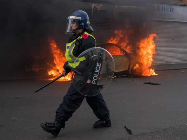 MIDDLESBROUGH, ENGLAND - AUGUST 04: A car burns on Parliament Road after it was set alight